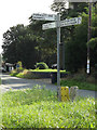 TM1389 : Roadsign on Church Road by Geographer