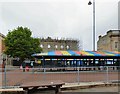 SJ9399 : The changing face of Ashton Market by Gerald England