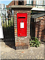 TM0595 : Station Road George VI Postbox by Geographer