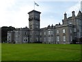 NJ7507 : Dunecht House with saltire above tower by Stanley Howe