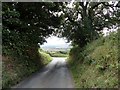 NZ0958 : Country lane junction by Robert Graham