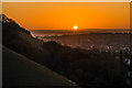 TQ2451 : Sunrise from The Saddle Knob by Ian Capper