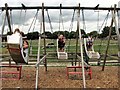 TQ5214 : Swingboats at Blackberry Farm park by Patrick Roper