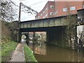 SJ8762 : Railway bridge over the Macclesfield Canal by Jonathan Hutchins