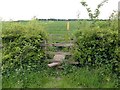 SK3822 : Double stile and footbridge by Graham Hogg