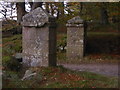 NJ6906 : Stone gateposts at exit from Midmar Kirk carpark by Stanley Howe