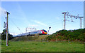 SK0021 : Passenger train south-west of Little Haywood in Staffordshire by Roger  D Kidd