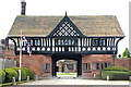 SJ3081 : Thornton Manor Gatehouse by Jeff Buck