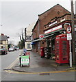 SJ3165 : Red phonebox on a Hawarden corner by Jaggery