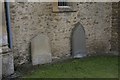 SU4894 : Headstones by the chapel wall by Bill Nicholls