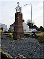 SJ3061 : Millennium Clock Tower in the centre of Penyffordd, Flintshire by Jaggery