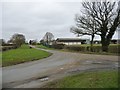 SP7541 : The road passing Grange Farm, Puxley by Christine Johnstone