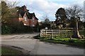 SP2853 : War memorial and cottage in Walton by Philip Halling