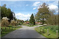 TM2241 : Entrance road at Seven Hills Crematorium by Geographer