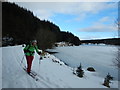 NN9046 : Skiing past frozen Loch Kennard by Andy Waddington