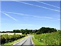 SK7178 : Contrails over the road to Eaton by Graham Hogg