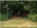 SP8171 : Footpath into woodland near Hannington by Malc McDonald