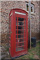 SE6638 : Disused telephone kiosk on Main Street, Skipwith by Ian S