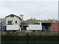 NT9464 : Vans loading at FMA, Eyemouth quayside by Stephen Craven