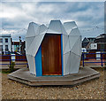 TV6199 : Eastbourne : What unearthed? beach hut by Jim Osley