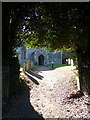 TM4198 : All Saints Church Path, Thurlton by Geographer