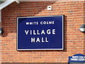 TL8729 : White Colne Village Hall sign by Geographer