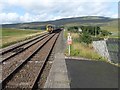 SD7678 : A Carlisle-bound train leaving Ribblehead station by Marathon