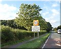 SK9858 : Speed limit and warning sign, A607 north of Navenby by David Smith