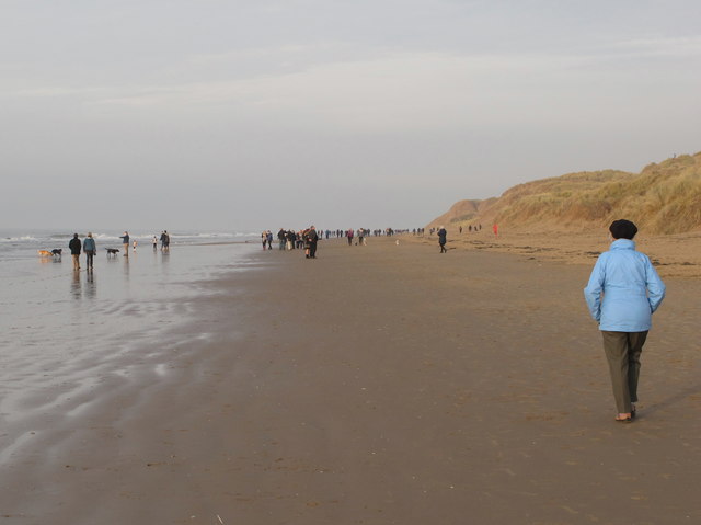 Walkers on sands at Formby Point, Boxing Day 2018