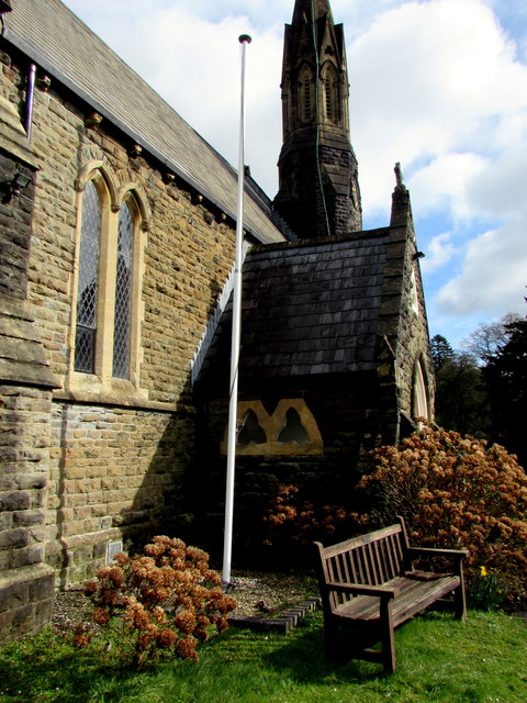 Flagpole and memorial bench in Machen