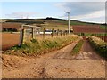  : Wind turbine by access lane to Collieston farm by Stanley Howe