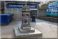 NS6360 : A small fountain outside Cambuslang train station in Glasgow by Garry Cornes