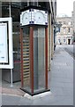 NO5016 : Clock outside TSB, St Andrews by Richard Sutcliffe