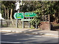 TM4599 : Roadsigns on the A143 Beccles Road by Geographer