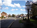 TM4599 : A143 Beccles Road & St. Olaves Village sign by Geographer