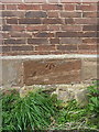 SP2490 : OS benchmark - Church End, barn on Shawbury Lane by Richard Law