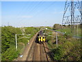 NZ3462 : Train approaching Brockley Whins by Malc McDonald