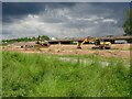 SO8451 : Excavators under a heavy sky by Philip Halling