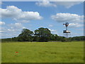 SP1403 : Windpump in field of unripe flax by Vieve Forward