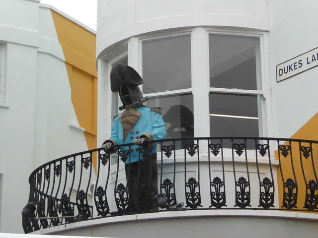 Figure on the balcony