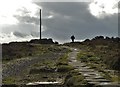 SK2484 : Runner passing Stanedge Pole by Neil Theasby