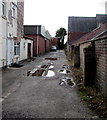 SJ2863 : Puddles on a Buckley side road by Jaggery