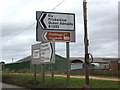 TL6185 : Roadsigns on the A1101 Mildenhall Road by Geographer