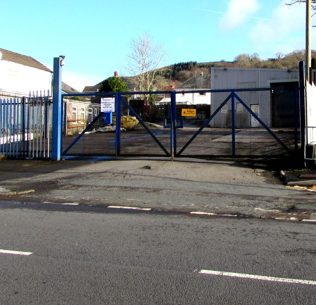 Locked gates at the entrance to vacant Main Road premises, Crynant