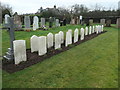 NX9875 : Commonwealth war graves, from the north by Christine Johnstone