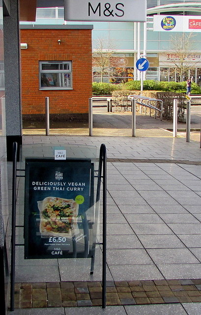 Deliciously Vegan Green Thai Curry board outside M&S in Newport Retail Park