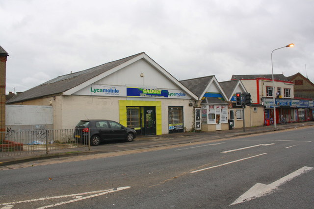 Shops on east side of Lincoln Road opposite Taverners Road junction