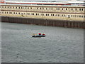 SD1968 : Two men in a boat, Devonshire Dock by Chris Allen