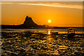 NU1341 : Sunrise behind Lindisfarne Castle by Ian Capper