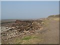 NX9825 : Old pier, Harrington by Adrian Taylor